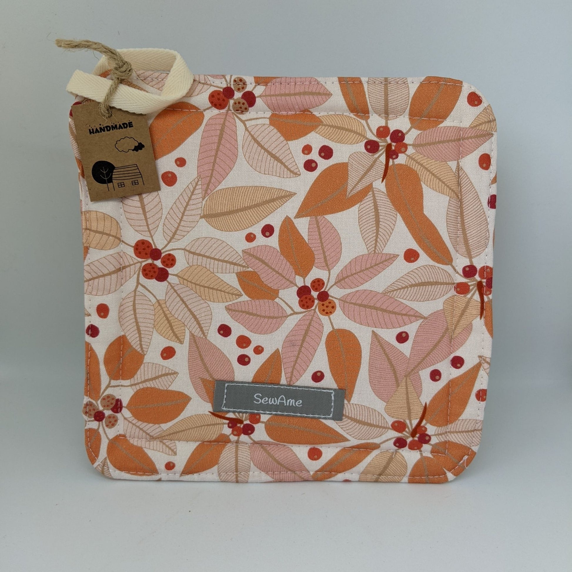 Handmade pot holder with Jocelyn Proust Australian Moreton Bay Fig Flower Fabric