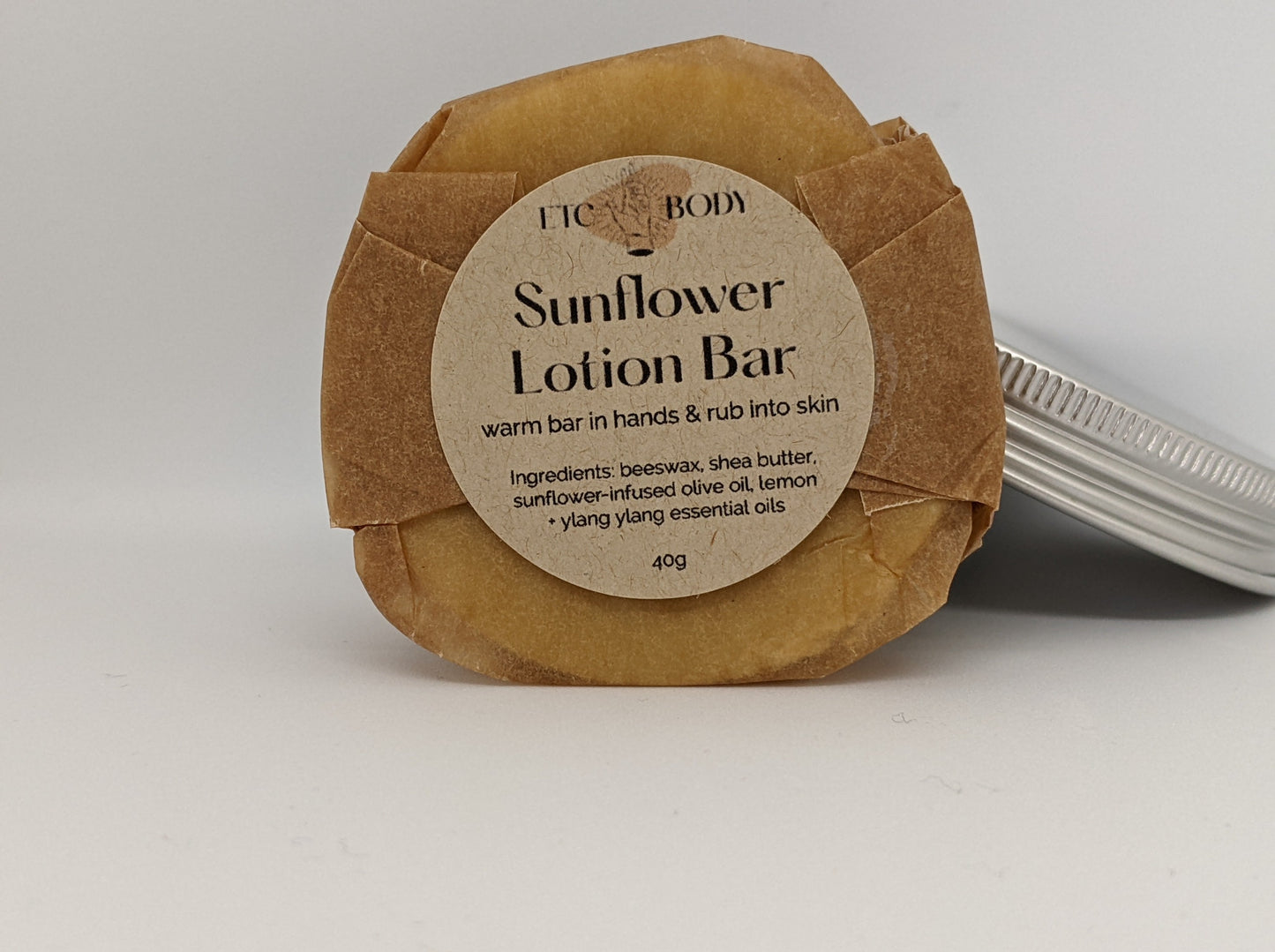 Sunflower Lotion bar with sunflower-infused olive oil. Warm bar in hands & rub into skin.